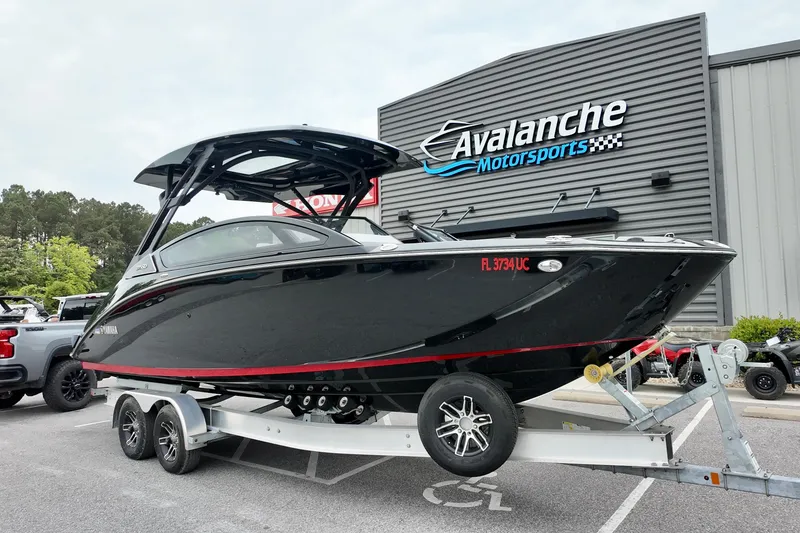 The Image of 2025 Yamaha 275 SD boat on trailer at Avalanche Motorsports dealership. - 1