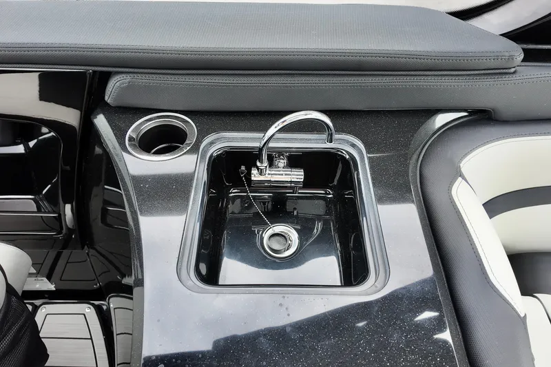 Slide: The Image of Luxury sink area on 2025 Yamaha 275 SD boat with sleek design. - 14