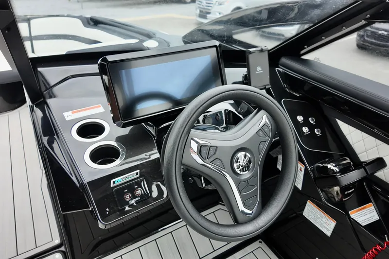 Slide: The Image of Steering console of 2025 Yamaha 275 SD boat with touchscreen and controls. - 15