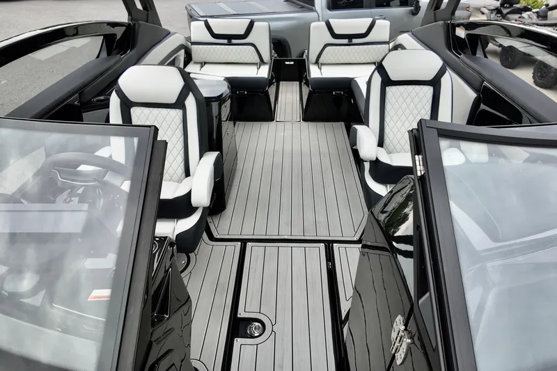 Slide: The Image of 2025 Yamaha 275 SD boat interior with sleek seating and modern design. - 20
