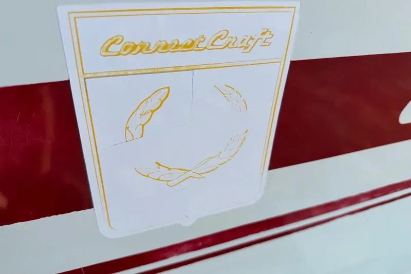 Slide: The Image of 1981 SKI NAUTIQUE Nautique boat decal with Correct Craft logo and red stripe. - 10