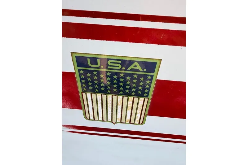 Slide: The Image of 1981 SKI NAUTIQUE Nautique with USA emblem and red stripes. - 11