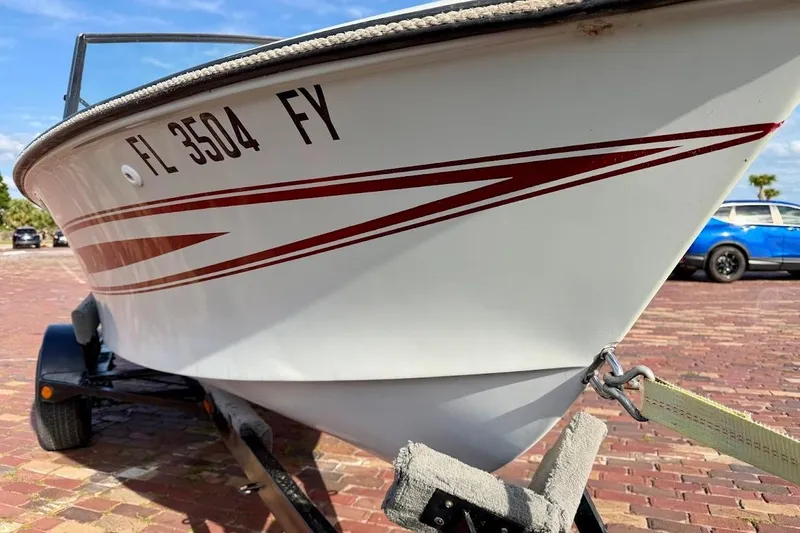 Slide: The Image of 1981 SKI NAUTIQUE boat on trailer, displaying registration FL 3504 FY. - 8
