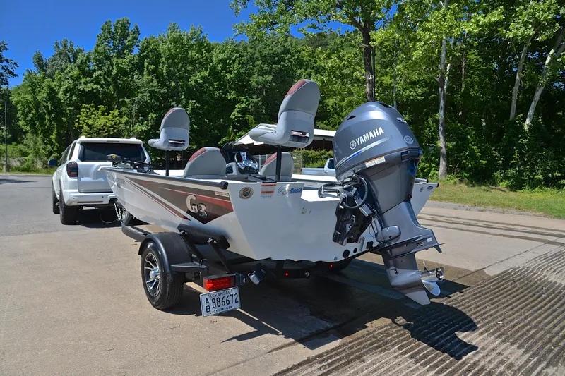Slide: The Image of 2023 G3 Sportsman 1610 boat with Yamaha motor on trailer, ready for launch. - 12