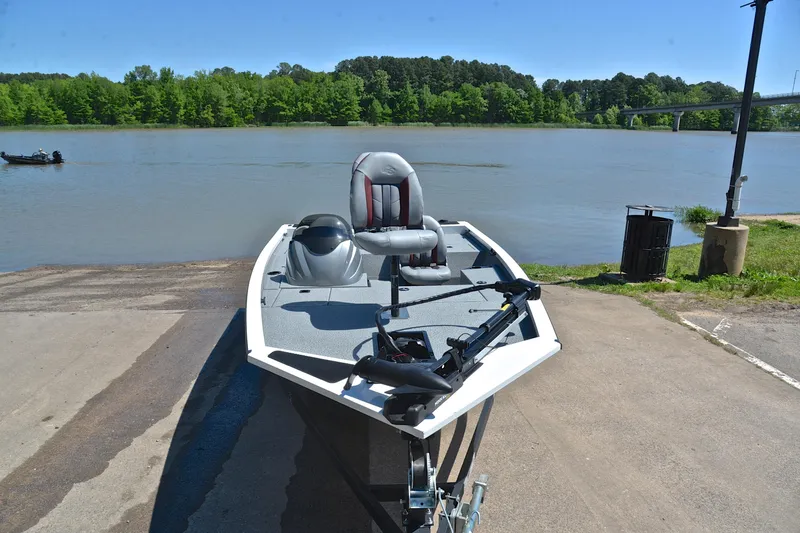Slide: The Image of 2023 G3 Sportsman 1610 boat on a concrete ramp by a scenic river. - 17