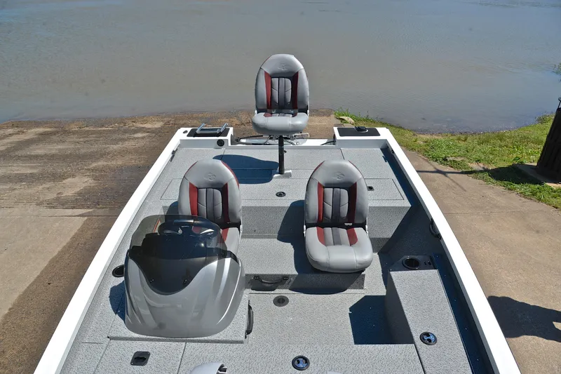 Slide: The Image of 2023 G3 Sportsman 1610 boat with dual seats, docked by a calm lake. - 22