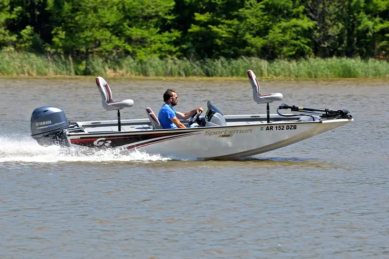 Slide: The Image of 2023 G3 Sportsman 1610 boat cruising on a lake with Yamaha engine. - 3