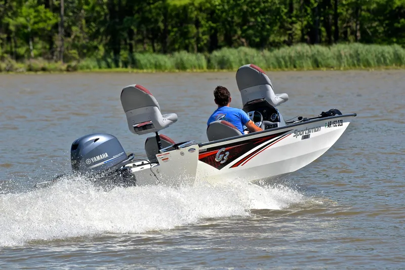 Slide: The Image of 2023 G3 Sportsman 1610 boat speeding on a lake with Yamaha engine. - 5