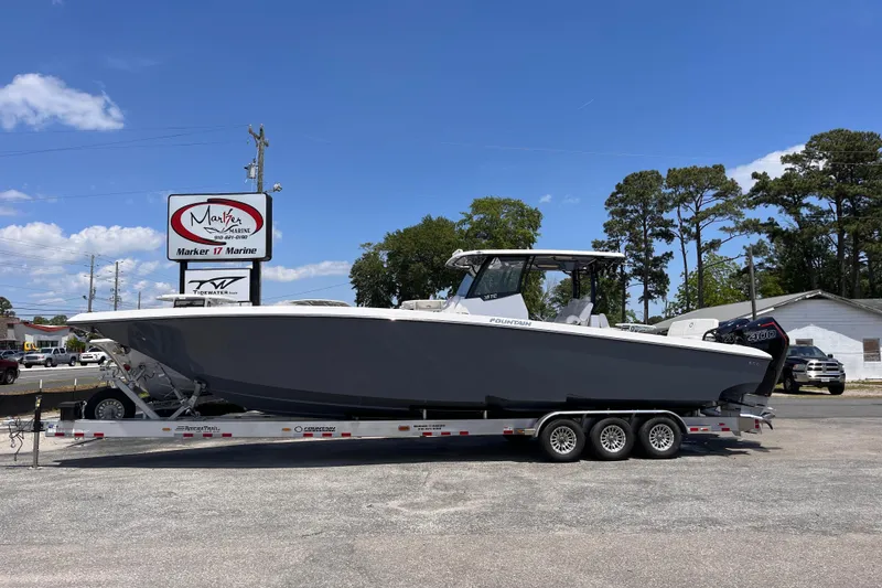 The Image of 2025 Fountain 38 Tournament Edition boat on trailer at Marker 17 Marine dealership. - 1