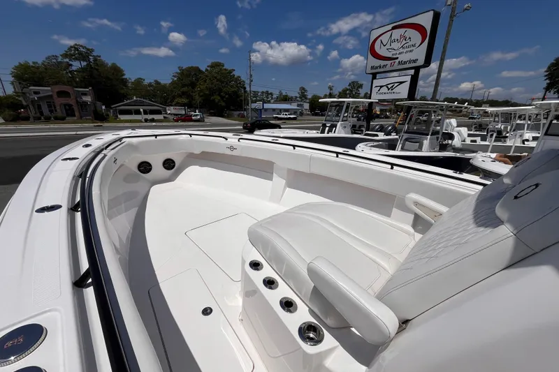 Slide: The Image of 2025 Fountain 38 Tournament Edition boat interior at Marker 17 Marine dealership. - 13