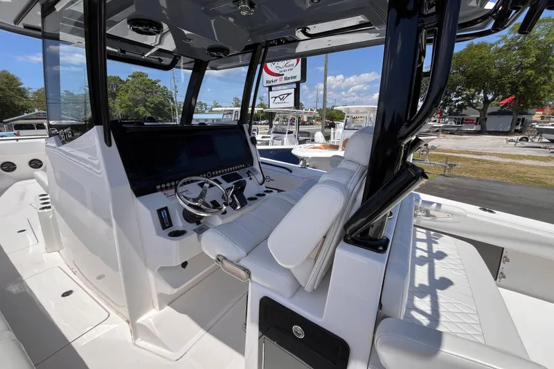 Slide: The Image of 2025 Fountain 38 Tournament Edition boat interior with modern helm and seating. - 15