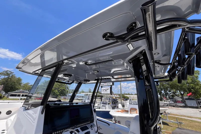 Slide: The Image of 2025 Fountain 38 Tournament Edition boat console with sleek design and advanced controls. - 16