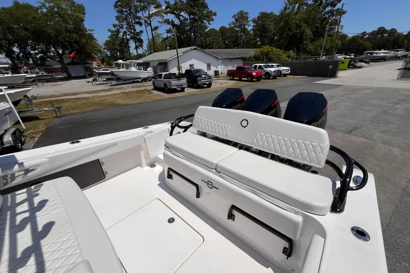Slide: The Image of 2025 Fountain 38 Tournament Edition boat with triple engines and white seating. - 17