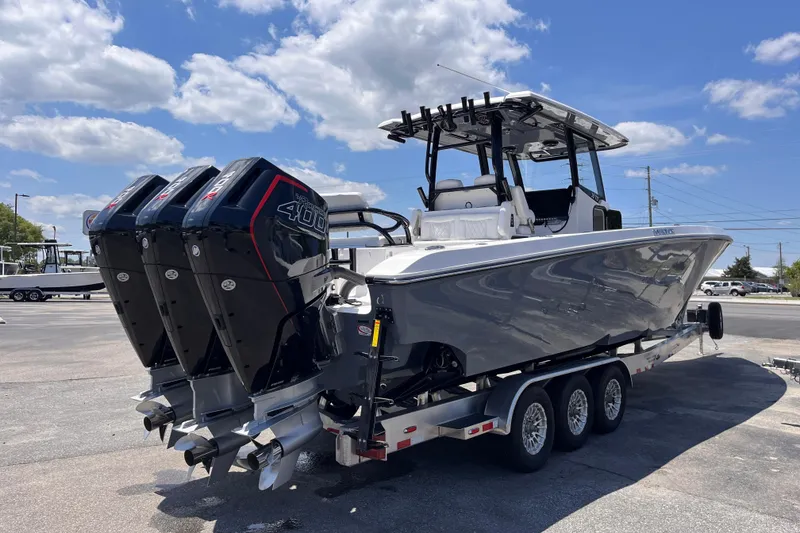 Slide: The Image of 2025 Fountain 38 Tournament Edition boat with triple 400 horsepower engines on a trailer. - 5