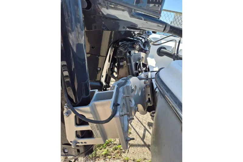 Slide: The Image of Close-up of 2018 Boca Bay 224 Bay boat engine and mounting components. - 11