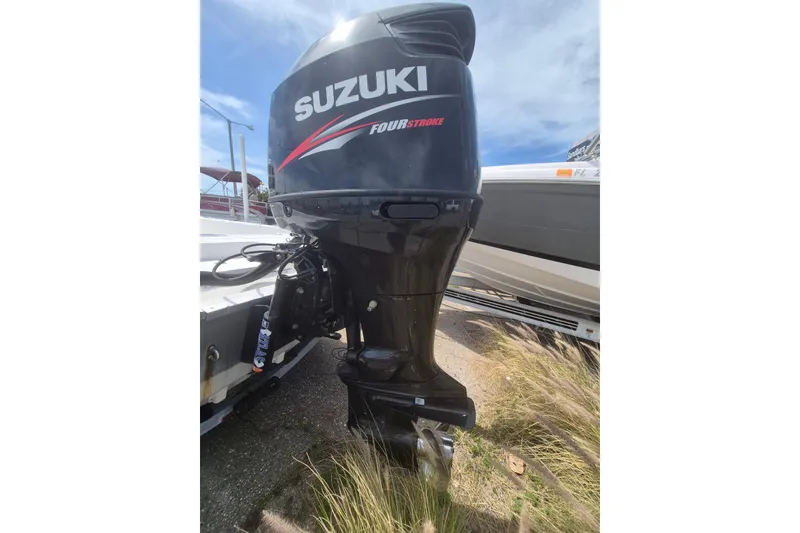Slide: The Image of 2018 Boca Bay 224 Bay boat with Suzuki four-stroke outboard motor. - 27