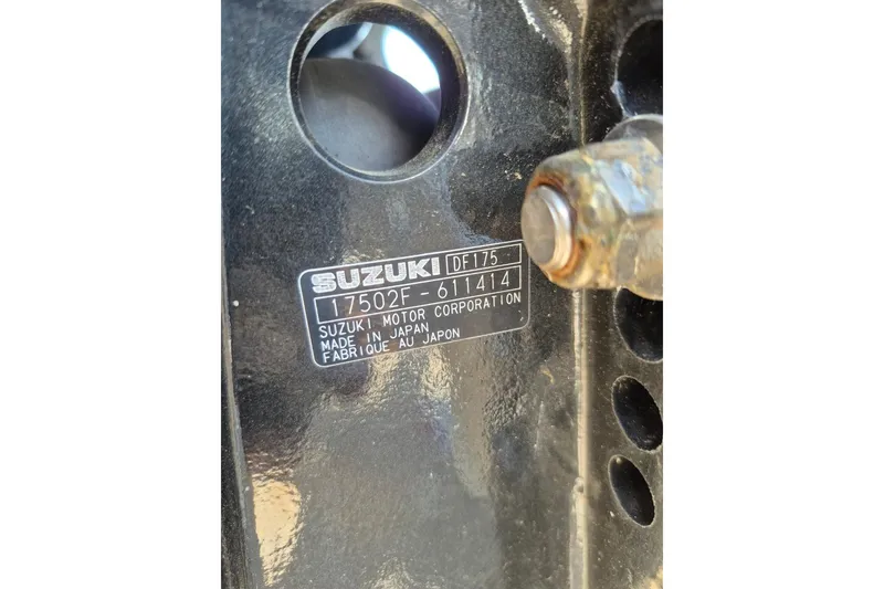 Slide: The Image of Close-up of a Suzuki motor label on a 2018 Boca Bay 224 Bay boat. - 32