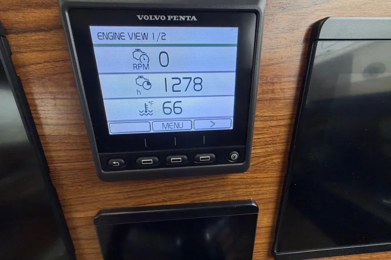 Slide: The Image of Volvo Penta engine display on 2024 Ranger Tugs R-29 CB, showing RPM and temperature. - 12