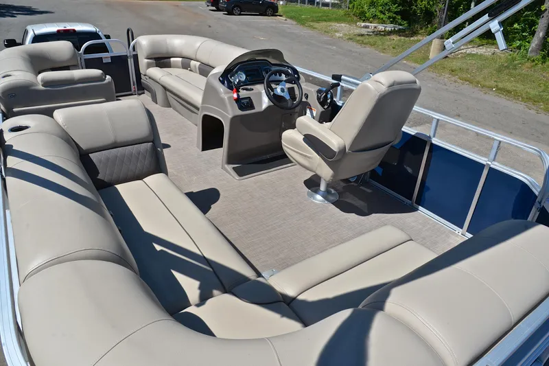 Slide: The Image of 2022 Sun Tracker Party Barge 20 DLX pontoon boat with spacious seating and modern helm. - 23