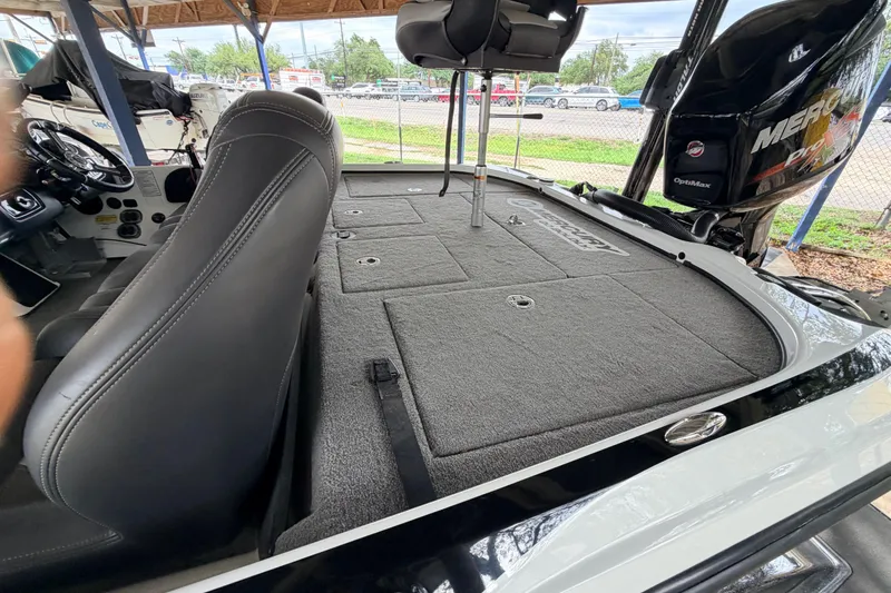 Slide: The Image of 2016 Nitro Z20 boat interior with seating and Mercury Pro XS engine. - 12