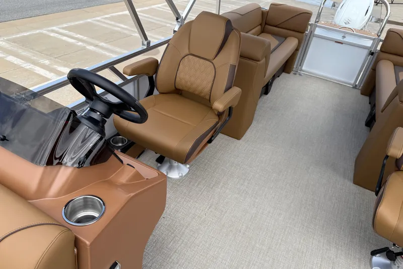 Slide: The Image of 2026 Avalon VENTURE QUAD LOUNGE interior with luxurious tan seating and modern steering console. - 14