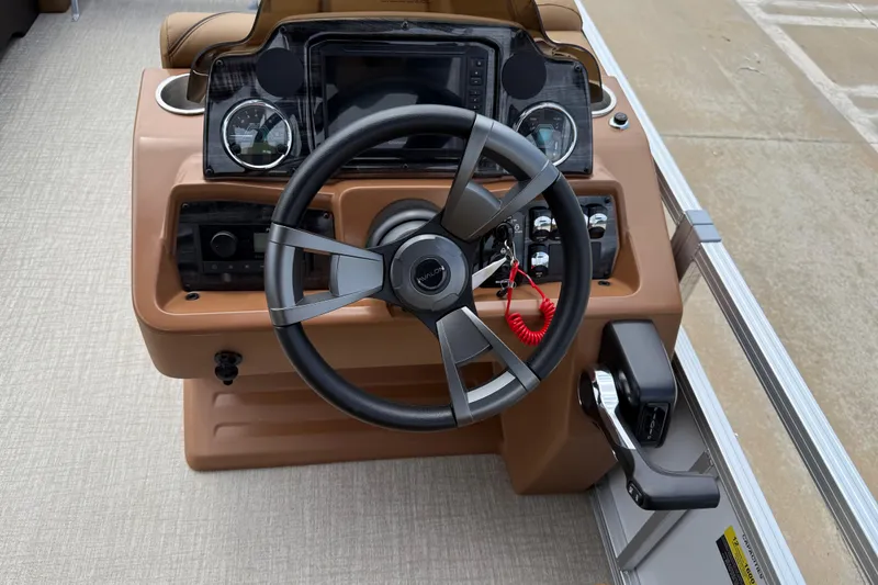 Slide: The Image of Steering console of 2026 Avalon VENTURE QUAD LOUNGE pontoon boat with modern controls. - 21