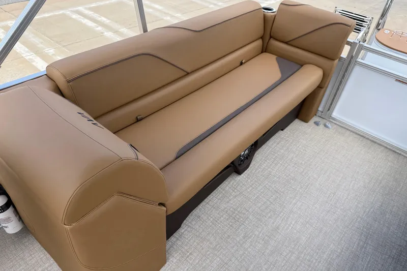 Slide: The Image of 2026 Avalon VENTURE QUAD LOUNGE interior with tan seating and modern design. - 32