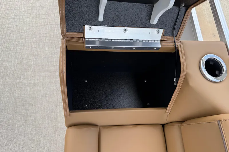 Slide: The Image of Open storage compartment in 2026 Avalon VENTURE QUAD LOUNGE with cup holder. - 34