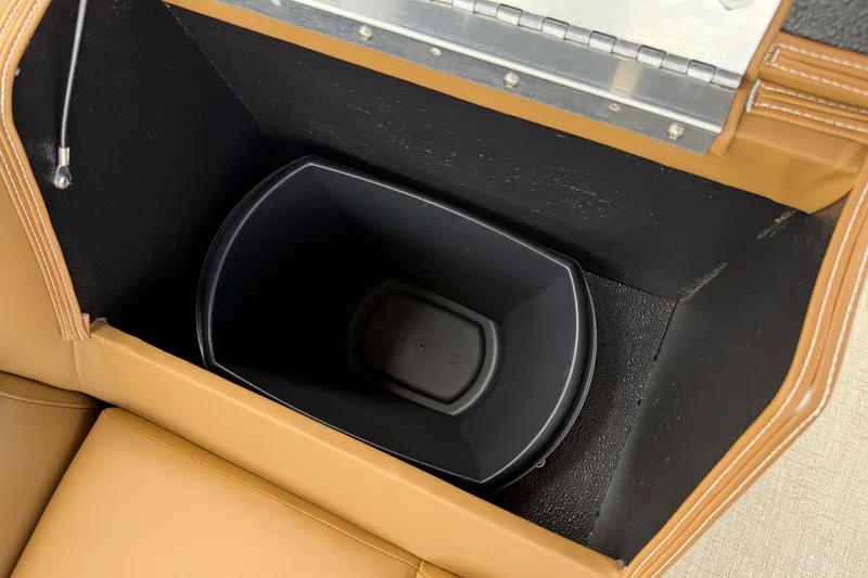Slide: The Image of Storage compartment with black bin in 2026 Avalon Venture Quad Lounge. - 36