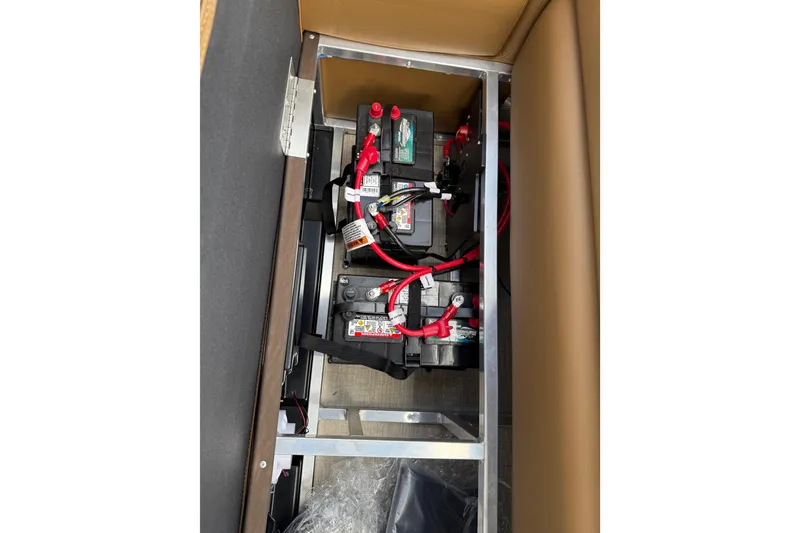 Slide: The Image of Battery compartment of 2026 Avalon VENTURE QUAD LOUNGE with visible wiring and connections. - 37