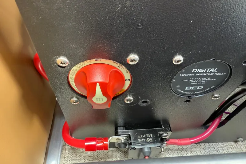Slide: The Image of Electrical panel with red switch and digital voltage relay in 2026 Avalon VENTURE QUAD LOUNGE. - 38