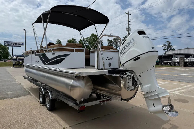 Slide: The Image of 2026 Avalon VENTURE QUAD LOUNGE pontoon boat with Suzuki outboard motor on trailer. - 5