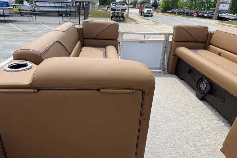 Slide: The Image of Luxurious seating on 2026 Avalon VENTURE QUAD LOUNGE pontoon boat, featuring tan upholstery. - 50