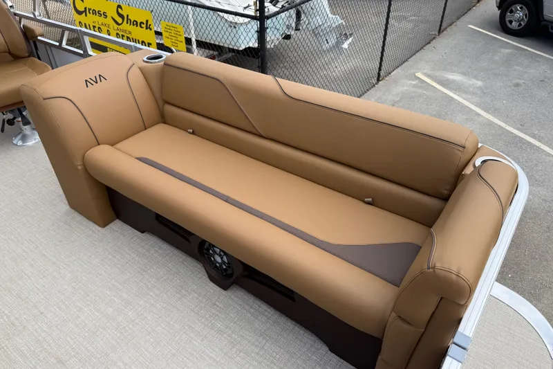 Slide: The Image of Luxurious seating on 2026 Avalon VENTURE QUAD LOUNGE boat, featuring tan upholstery and sleek design. - 9