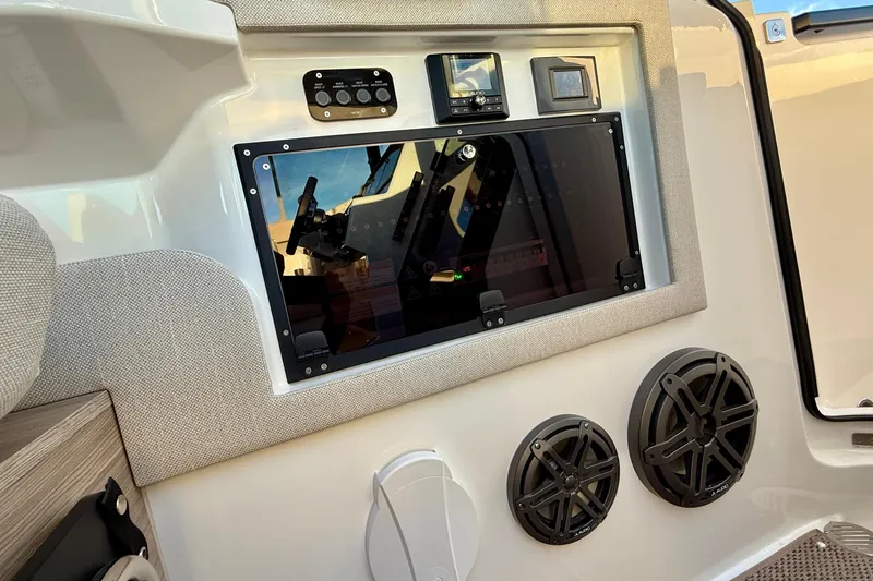Slide: The Image of 2025 Saxdor 320 GTC dashboard with control panel and speakers. - 33