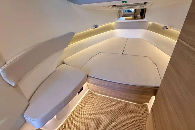 Slide: The Image of Luxurious interior of 2025 Saxdor 320 GTC boat with modern seating and ambient lighting. - 43