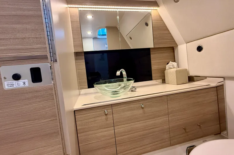 Slide: The Image of Luxurious bathroom interior of 2025 Saxdor 320 GTC with modern glass sink and wooden cabinetry. - 45
