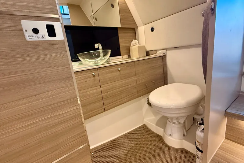 Slide: The Image of Luxurious bathroom in 2025 Saxdor 320 GTC yacht with modern fixtures and wood accents. - 46