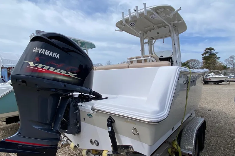 Slide: The Image of 2019 Sportsman Heritage 231 Center Console boat with Yamaha VMAX outboard motor. - 5