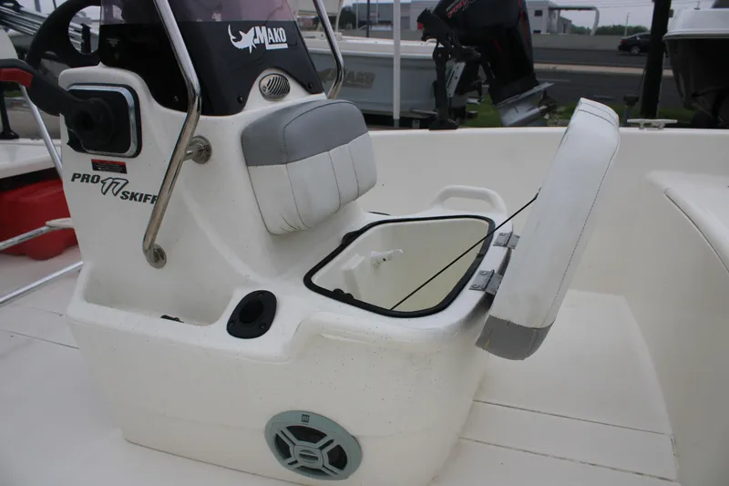 Slide: The Image of 2021 Mako Pro Skiff 17 CC boat console with open storage compartment. - 10