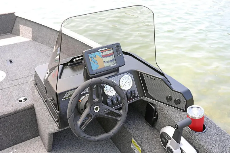 The Image of Manufacturer Provided Image: 2025 Lund 1650 Angler SS boat dashboard with steering wheel and navigation system. - 2