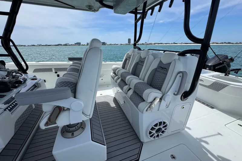 Slide: The Image of 2025 Invincible 40 Catamaran interior with luxurious seating and ocean view. - 30