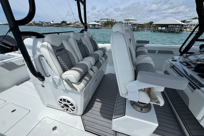 Slide: The Image of 2025 Invincible 40 Catamaran interior with luxurious seating and modern design. - 31
