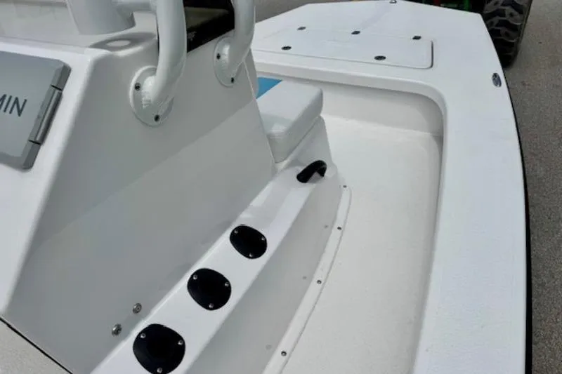Slide: The Image of 2024 Majek 18 M2 boat interior with seating and storage compartments. - 12