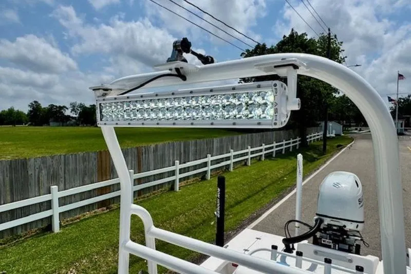 Slide: The Image of 2024 Majek 18 M2 boat with mounted LED light bar on a sunny day. - 15