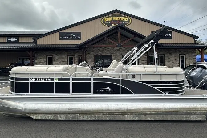 The Image of 2026 Bennington 2250 GSR pontoon boat parked outside Boat Masters dealership. - 0