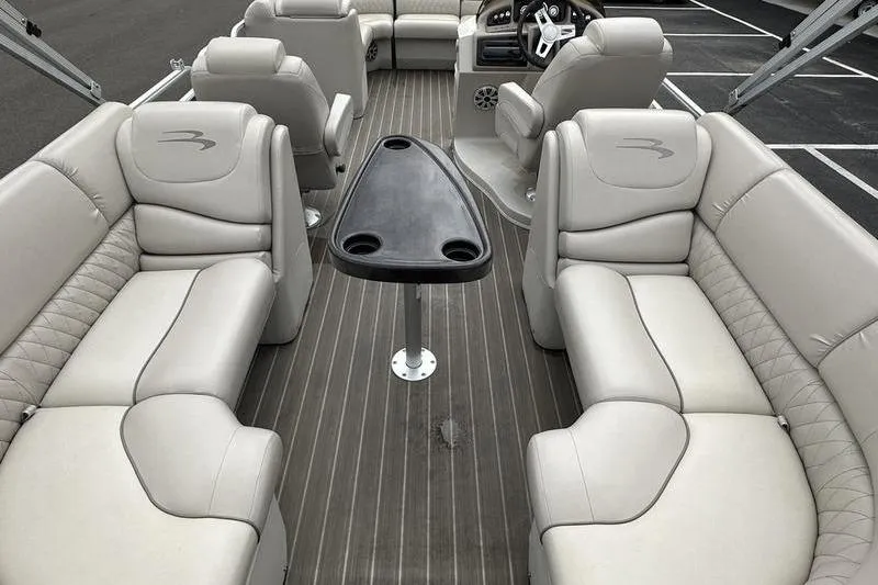 Slide: The Image of 2026 Bennington 2250 GSR pontoon boat interior with luxurious seating and sleek design. - 11