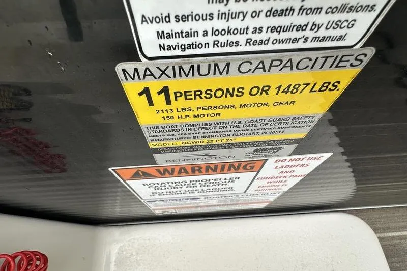 Slide: The Image of Capacity label on 2026 Bennington 2250 GSR, max 11 persons or 1487 lbs. - 23