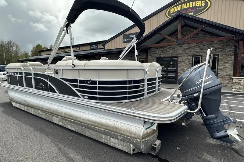 Slide: The Image of 2026 Bennington 2250 GSR pontoon boat with Yamaha motor at dealership. - 24