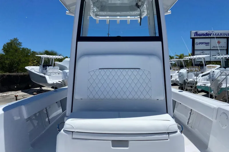Slide: The Image of 2026 Sportsman Masters 247 Bay Boat interior with sleek seating and modern design at Thunder Marine. - 16
